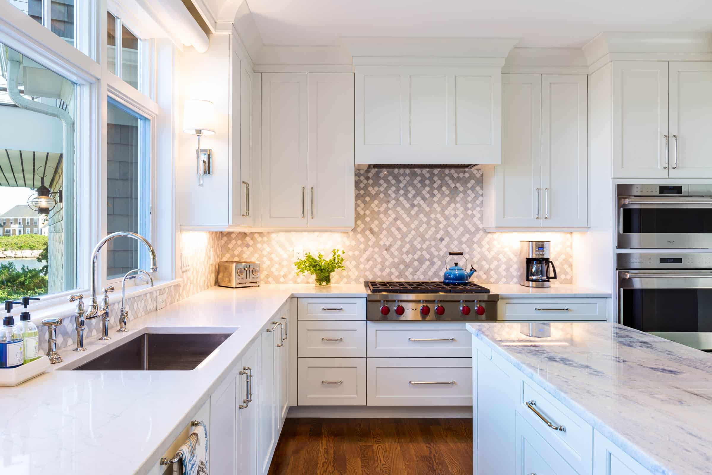 white cabinets are often associated with light and airy kitchens,