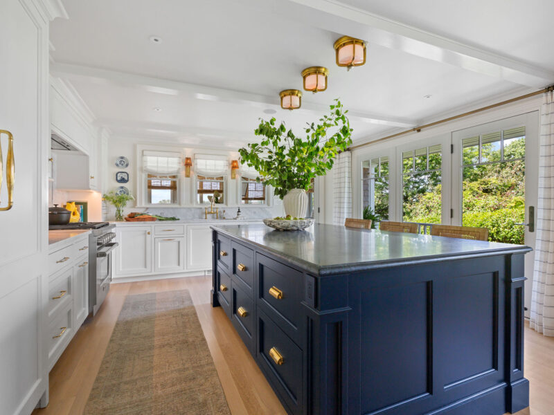A renovated kitchen with sleek colors and bright light – McPhee Associates of Cape Cod.