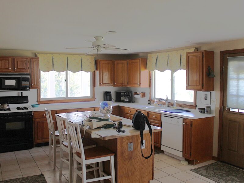 Before photo of 1970s colonial kitchen remodel in Dennis.