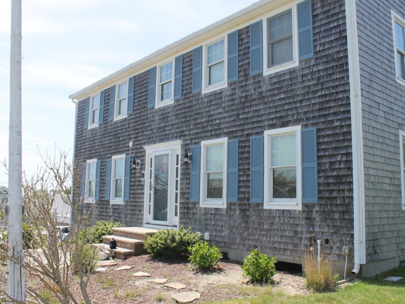 1970s colonial home in Dennis before it was remodeled by McPhee Associates of Cape Cod.